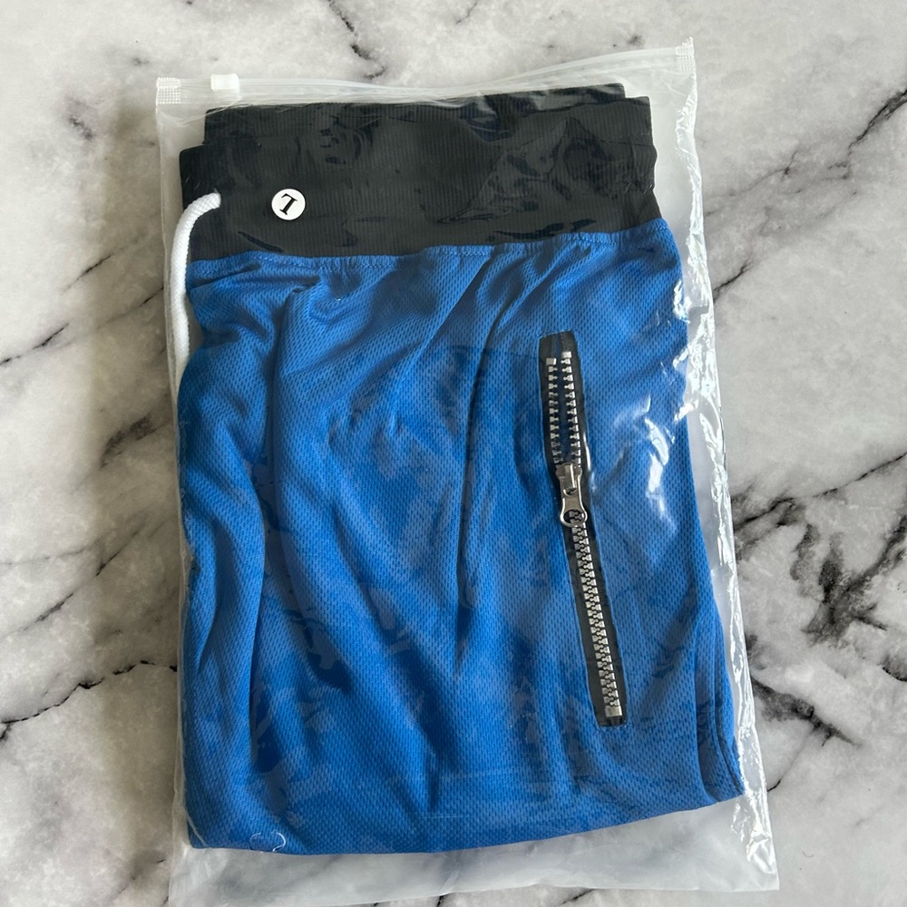 Blue basketball shorts with Black Waistband